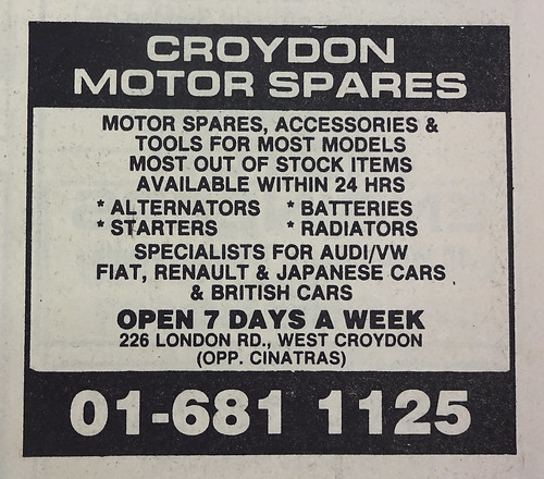 A newspaper advert reading: “Croydon Motor Spares / Motor spares, accessories & tools for most models / Most out of stock items available within 24 hrs / Alternators / Batteries / Starters / Radiators / Specialists for Audi/VW / Fiat, Renault & Japanese cars & British cars / Open 7 days a week / 226 London Rd., West Croydon (opp. Cinatras) / 01-681 1125”.